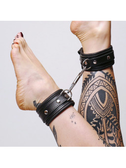 Chevillères en cuir molletonné et attaches argentées